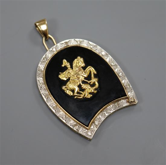 A yellow metal, black onyx and diamond set shaped pendant depicting St. George & the Dragon, 36mm.